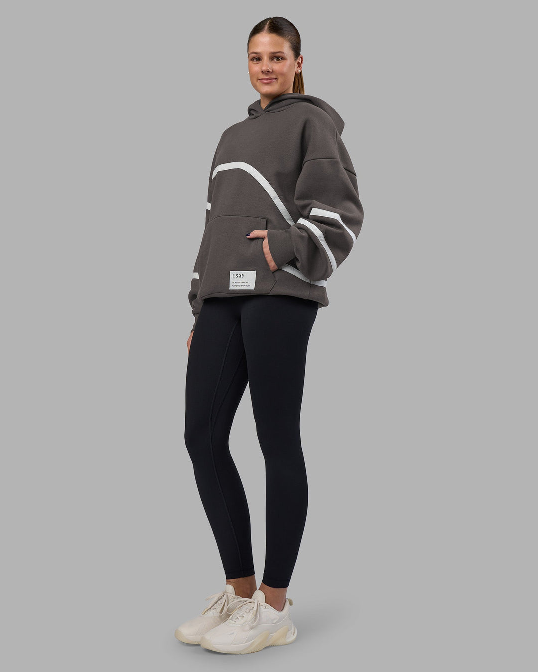 Woman wearing Movement Oversized Hoodie - Dark Storm-Digital Mist | Model:Phoebe | Size:XS