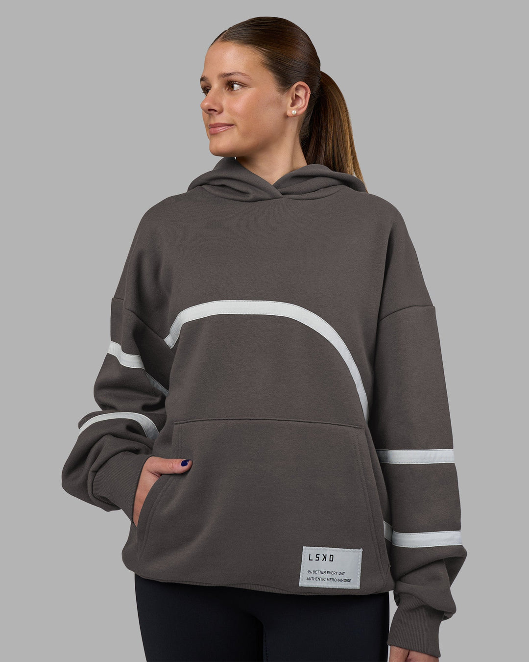 Woman wearing Movement Oversized Hoodie - Dark Storm-Digital Mist | Model:Phoebe | Size:XS