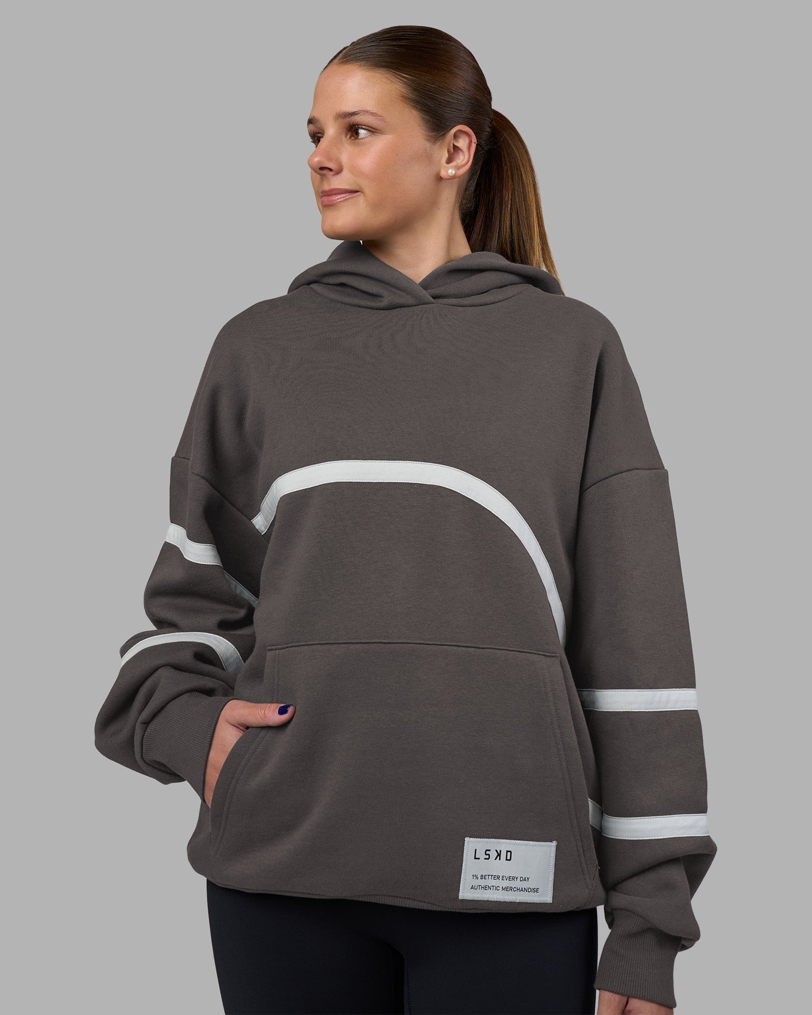 Woman wearing Movement Oversized Hoodie - Dark Storm-Digital Mist | Model:Phoebe | Size:XS