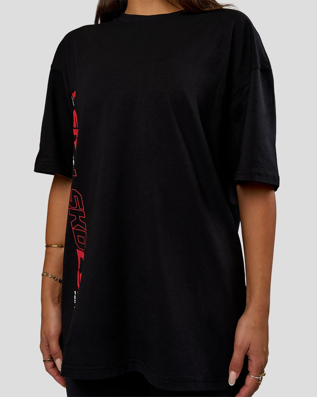 Woman wearing Nothing Is Impossible FLXCotton Oversized Tee - Black-Flame | Model:Bianca | Size:XS