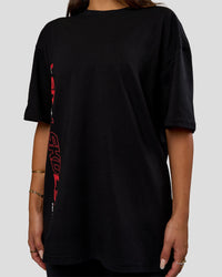 Woman wearing Nothing Is Impossible FLXCotton Oversized Tee - Black-Flame | Model:Bianca | Size:XS
