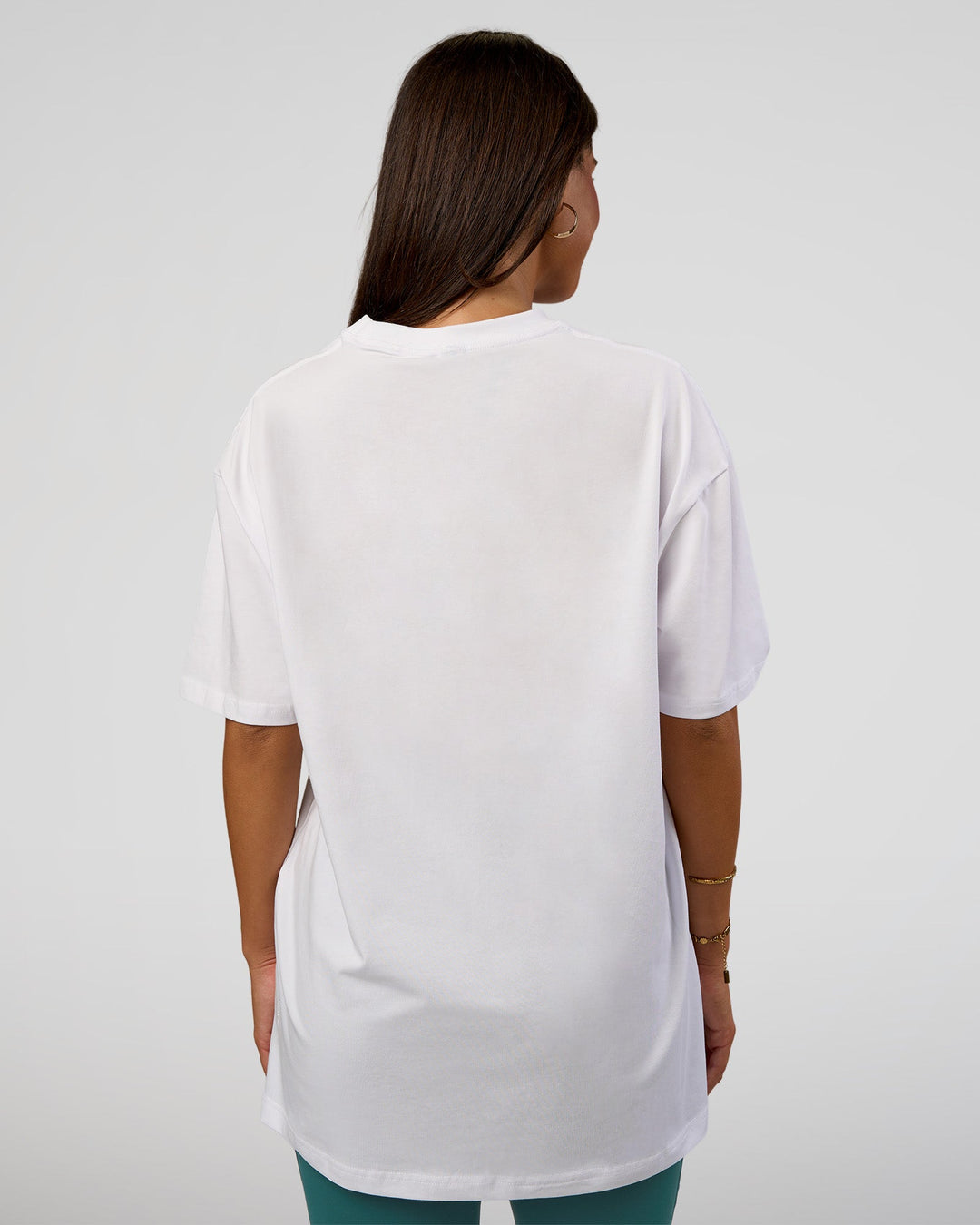 Woman wearing Nothing Is Impossible FLXCotton Oversized Tee - White-Vital Green | Model:Bianca | Size:XS