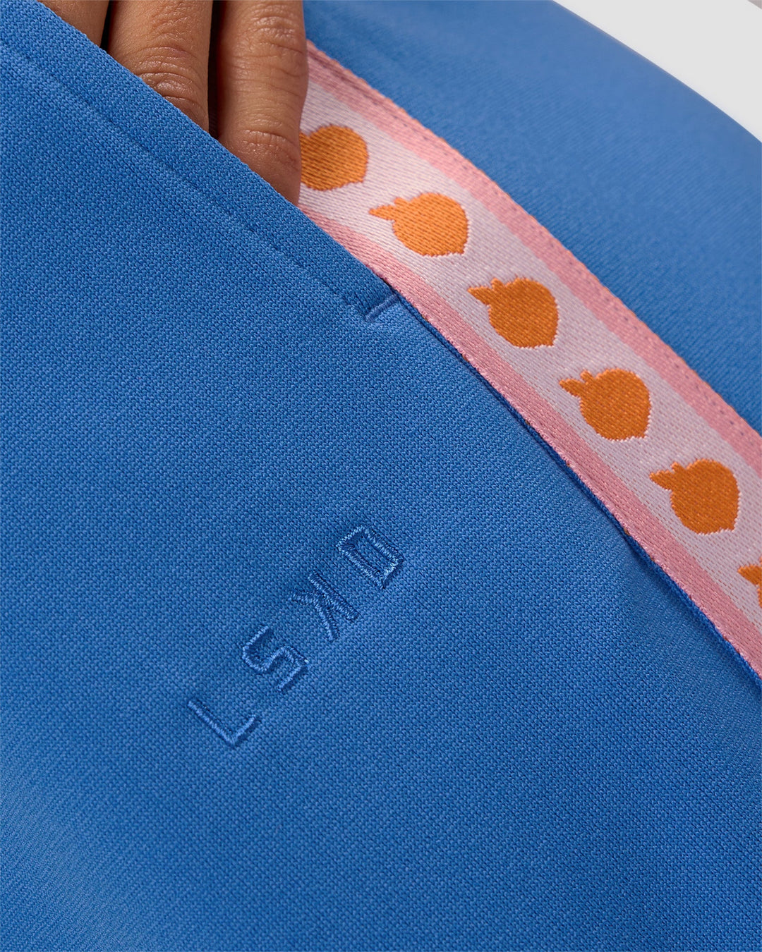 Woman wearing Peaches Track Pant - Palace Blue | Model:Brylee | Size:XS - view 3