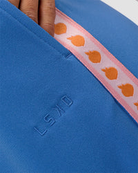 Woman wearing Peaches Track Pant - Palace Blue | Model:Brylee | Size:XS | Thumbnail Index: 2