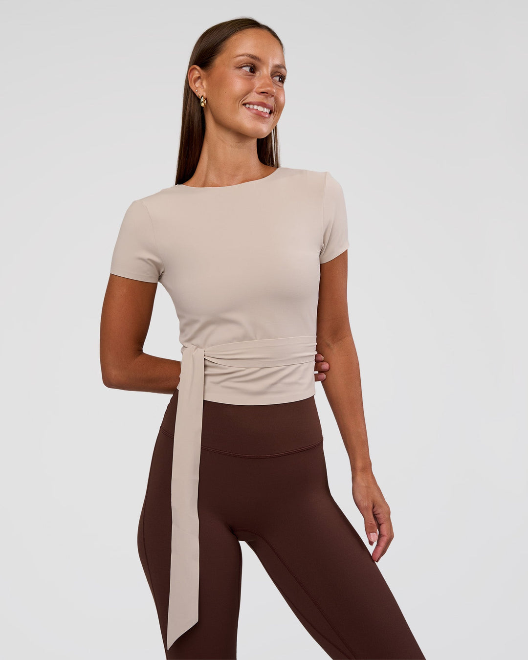 Woman wearing Peaches Wrap Cinch Top - Shale Beige | Model:Brylee | Size:XS - view 2