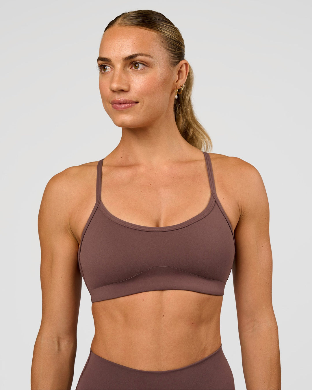 Woman wearing Pinnacle Sports Bra - Cocoa Powder | Model:Maja | Size:XS - view 3