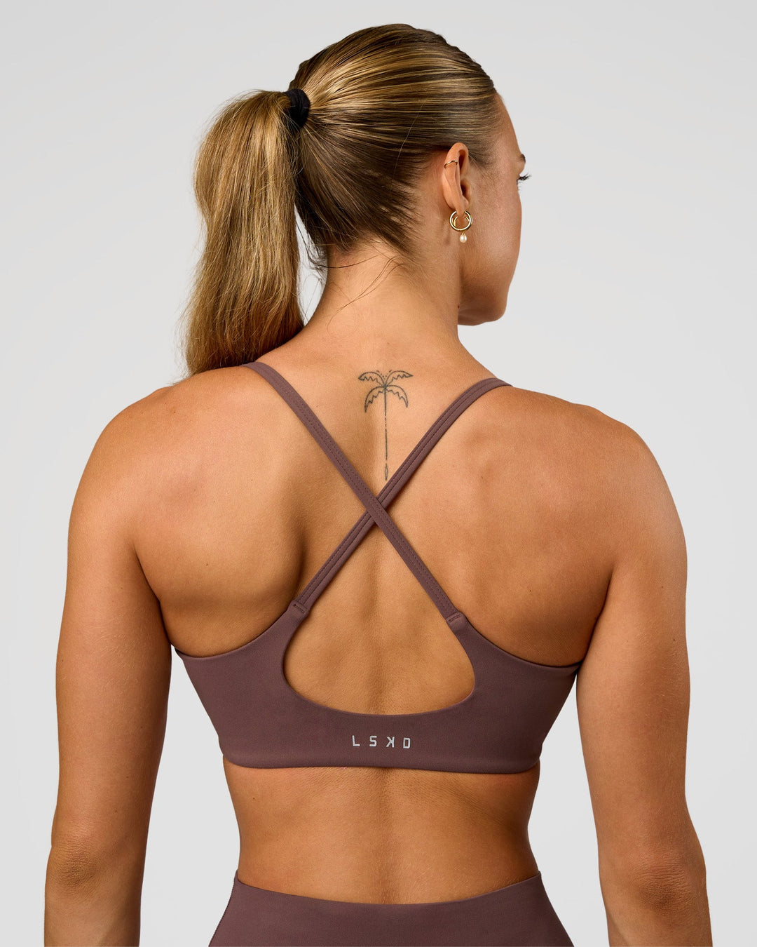 Woman wearing Pinnacle Sports Bra - Cocoa Powder | Model:Maja | Size:XS - view 6