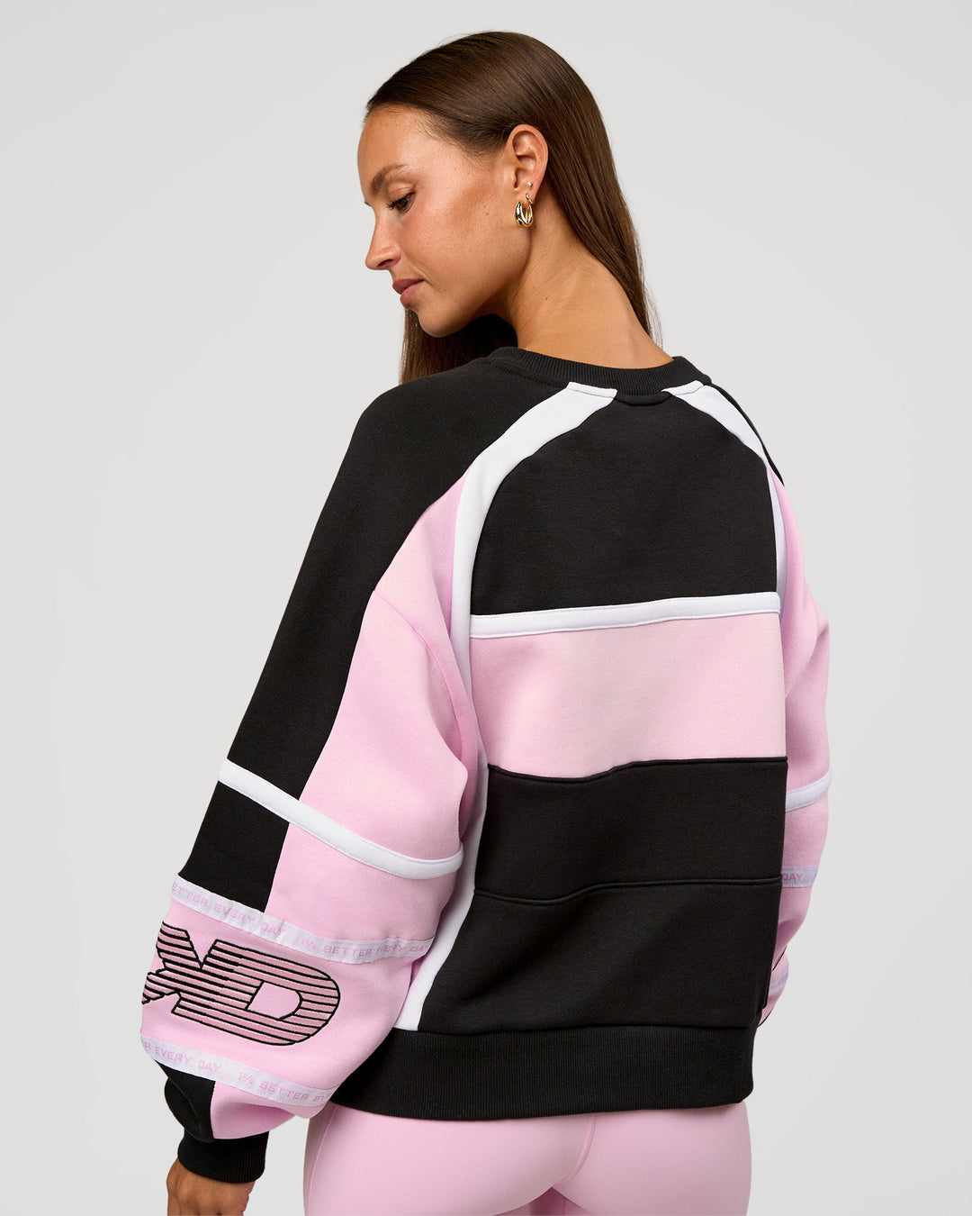Woman wearing Power Sweater - Caviar-Marshmallow | Model:Brylee | Size:XS