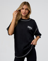 Woman wearing Pressure is Privilege Oversized Tee - Black-White | Model:Leilani | Size:XS