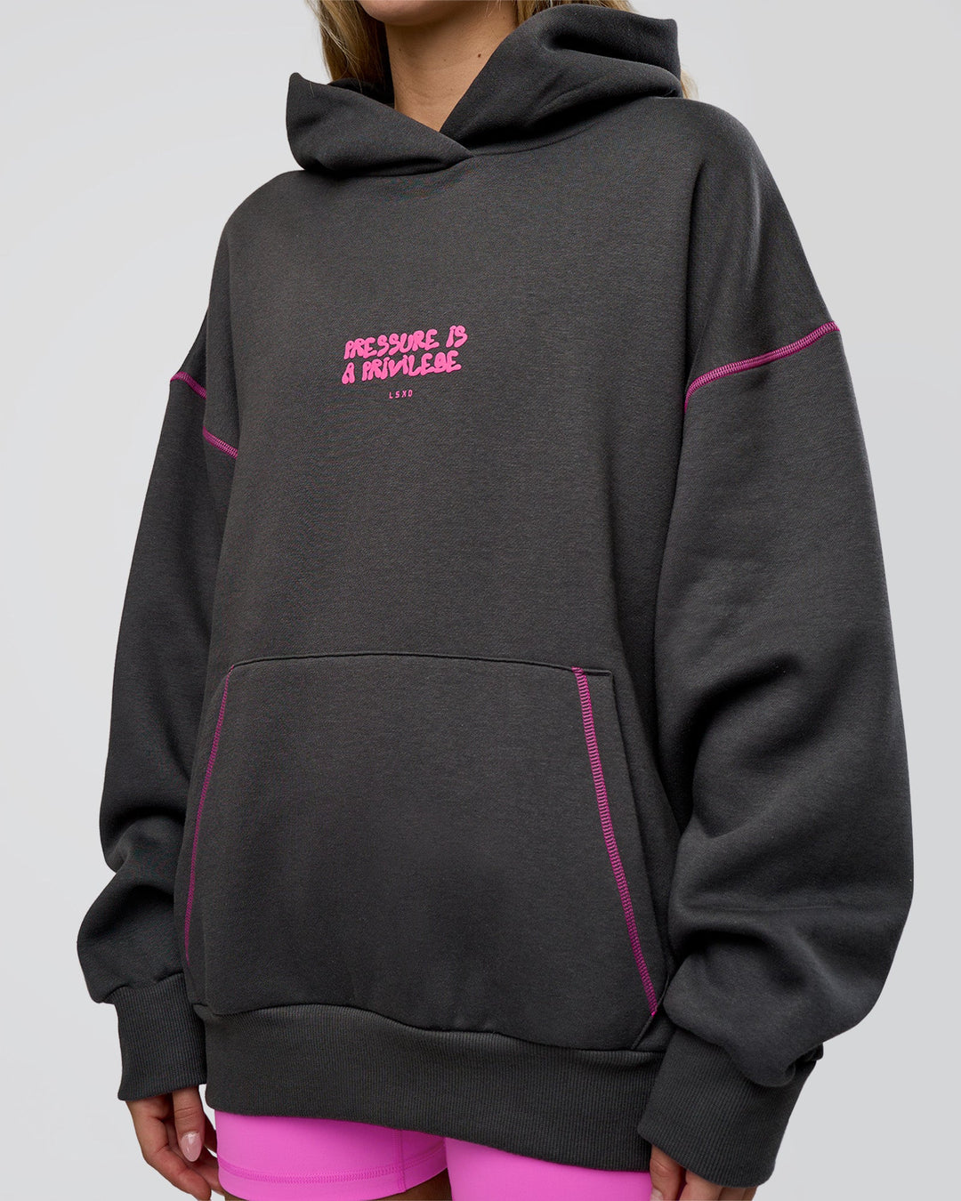 Woman wearing Pressure is Privilege Oversized Hoodie - Dark Storm-Ultra Fuchsia | Model:Leilani | Size:XS