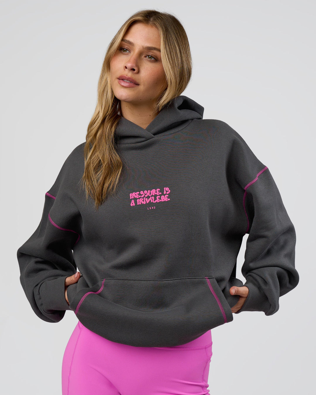 Woman wearing Pressure is Privilege Oversized Hoodie - Dark Storm-Ultra Fuchsia | Model:Leilani | Size:XS