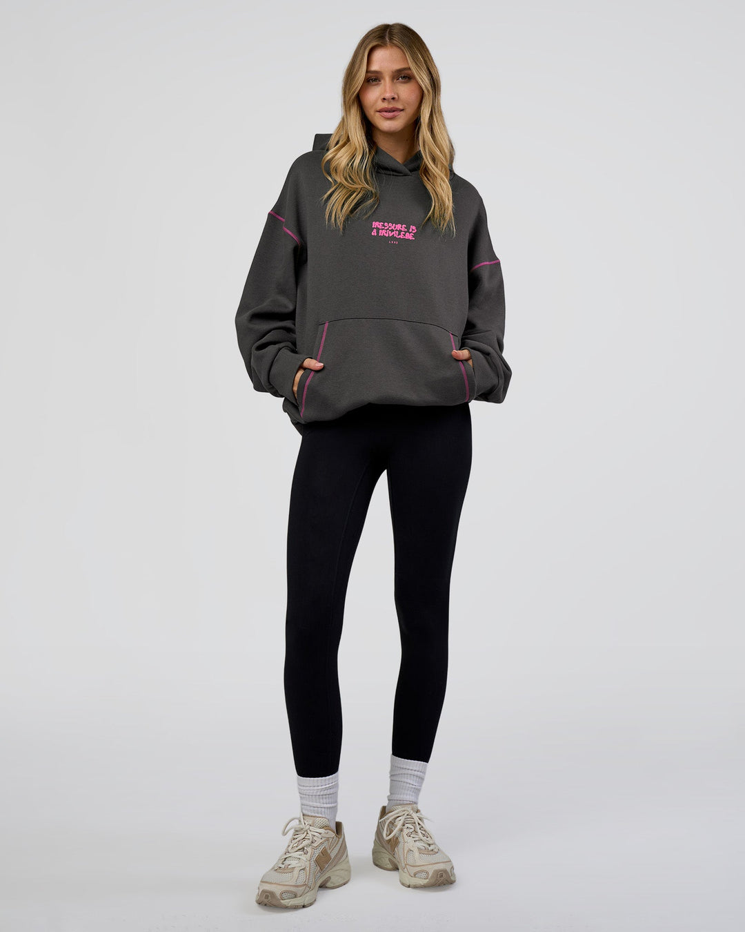 Woman wearing Pressure is Privilege Oversized Hoodie - Dark Storm-Ultra Fuchsia | Model:Leilani | Size:XS