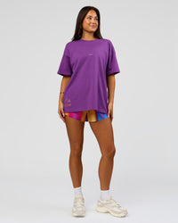 Woman wearing Pride Sticker Boxy Tee - Fresh Purple | Model:Bianca | Size:XS