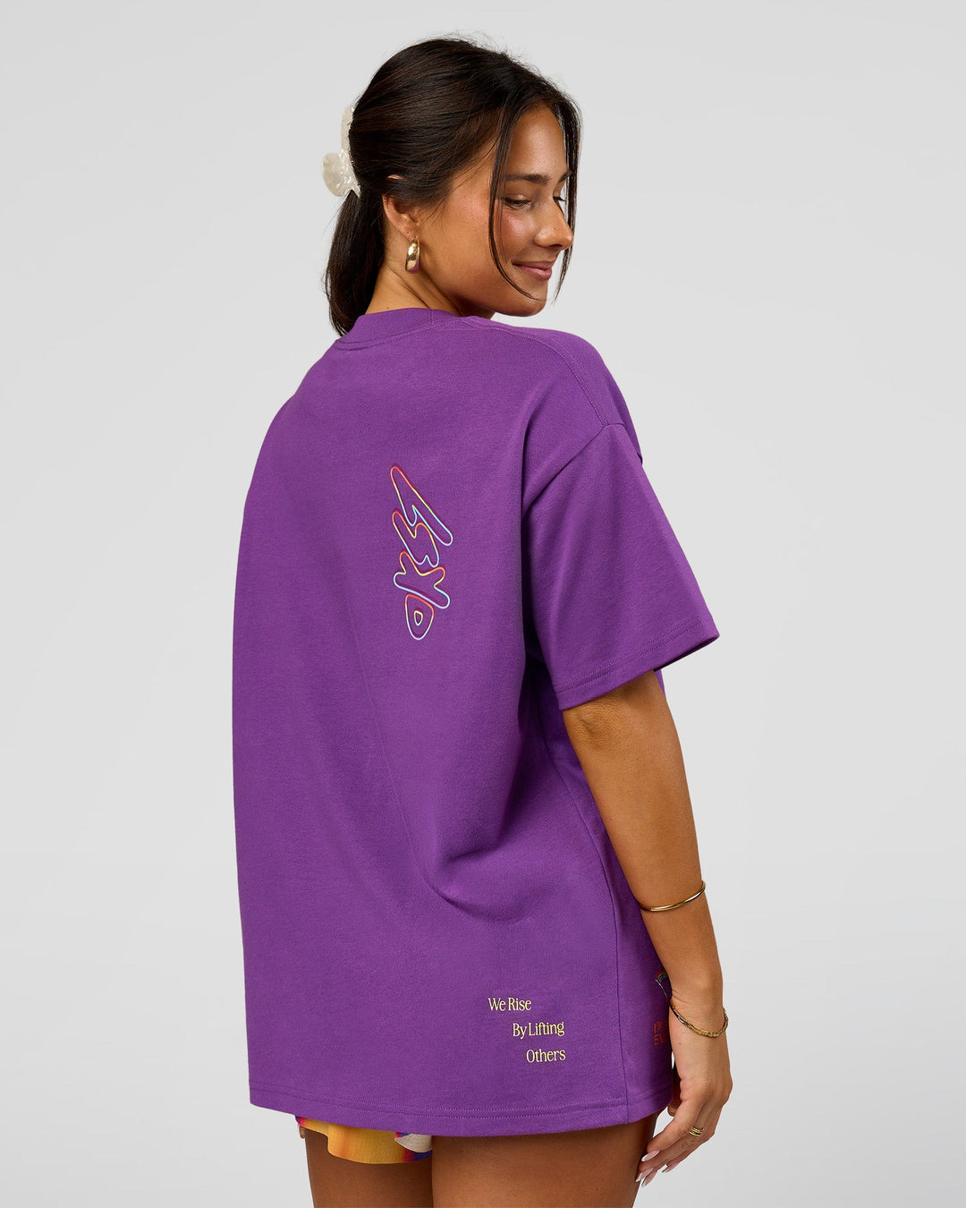 Woman wearing Pride Sticker Boxy Tee - Fresh Purple | Model:Bianca | Size:XS