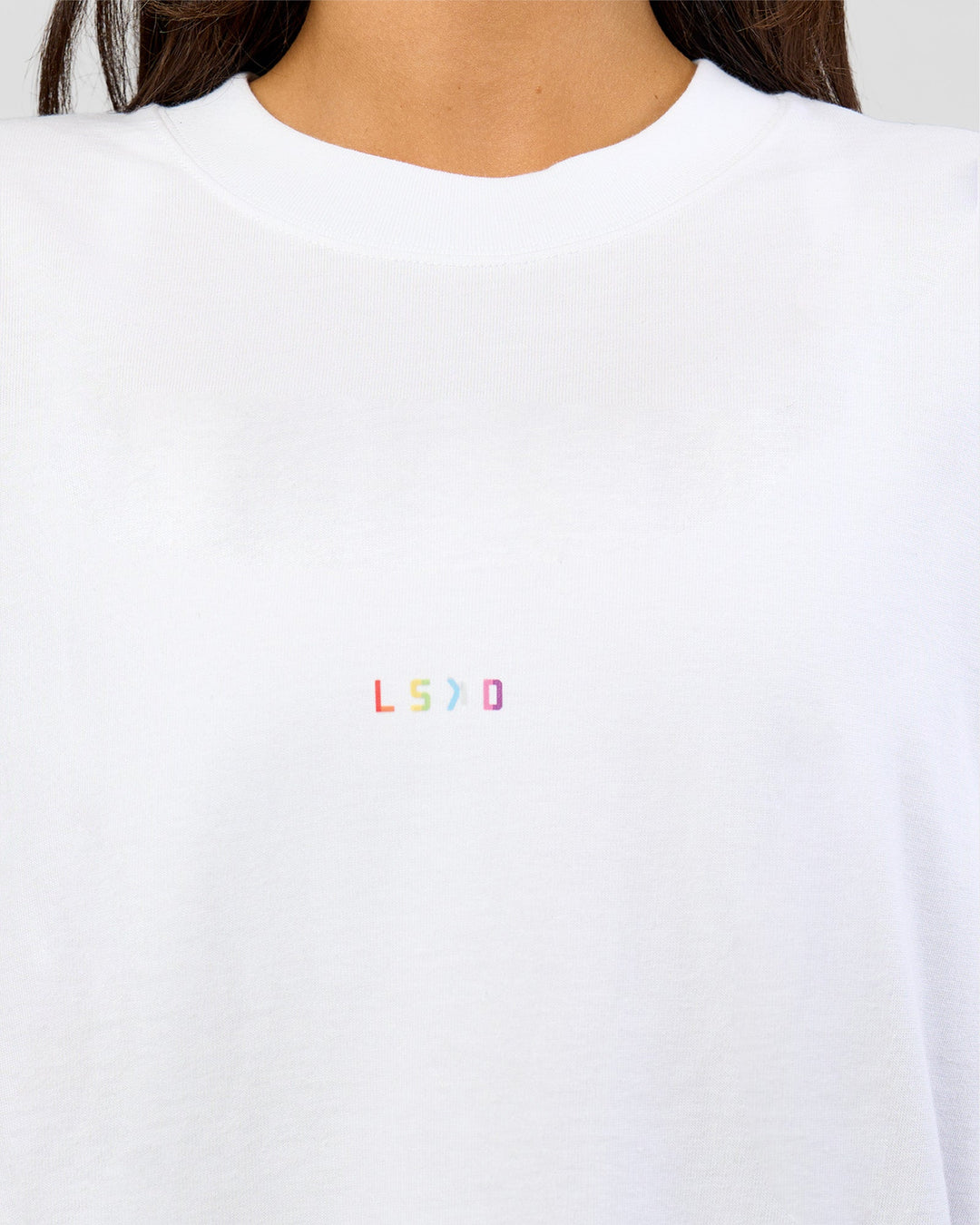 Woman wearing Pride Sticker Boxy Tee - White | Model:Bianca | Size:XS