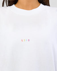 Woman wearing Pride Sticker Boxy Tee - White | Model:Bianca | Size:XS