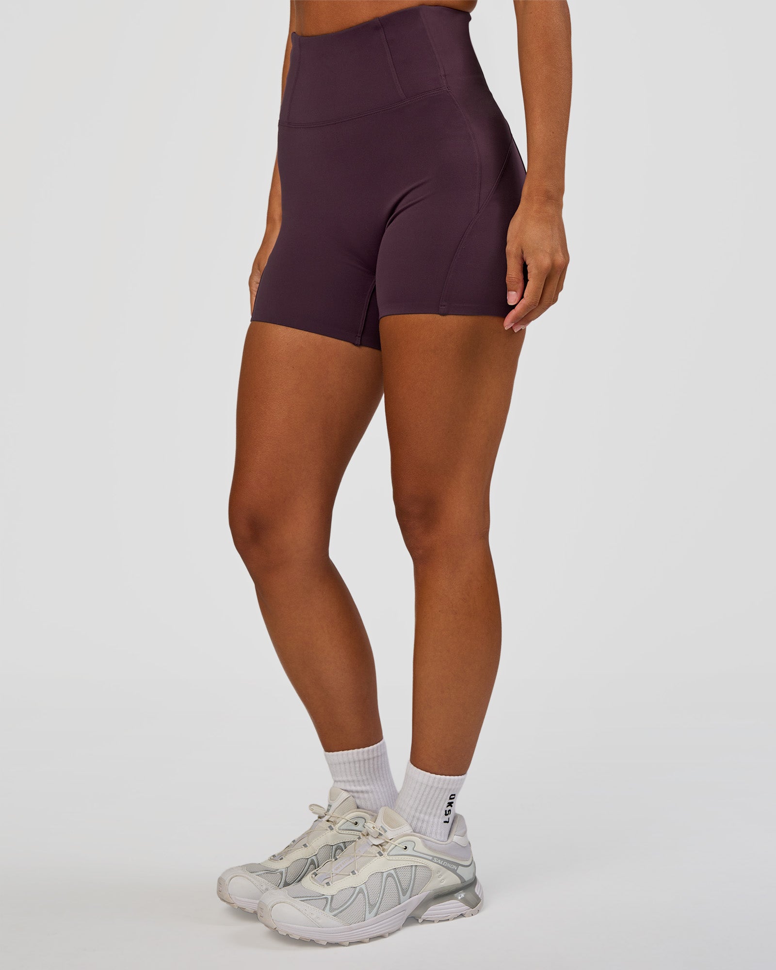 Woman wearing Progression Ultra High-Rise 4" Short - Midnight Plum | Model:Brylee | Size:XS