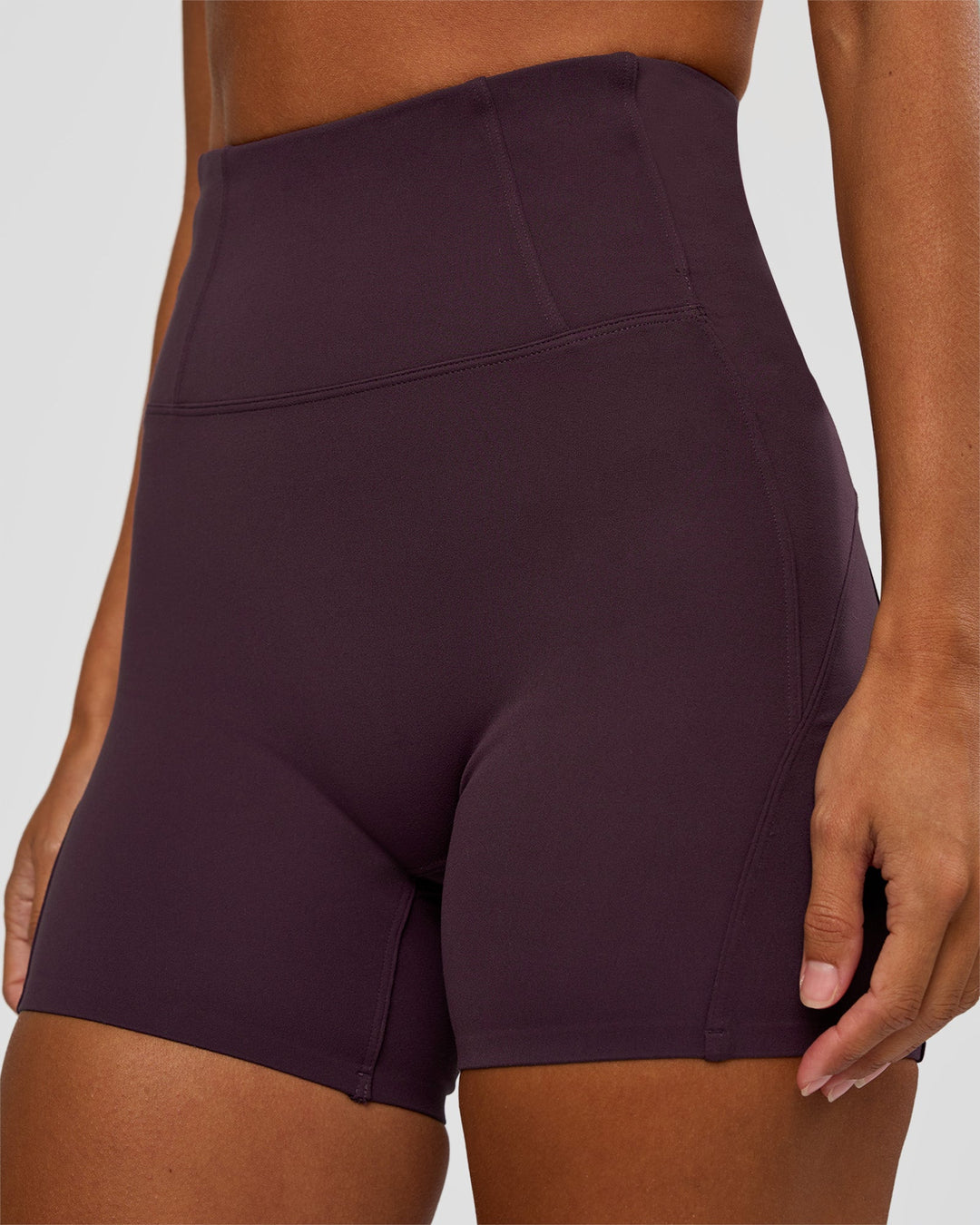 Woman wearing Progression Ultra High-Rise 4" Short - Midnight Plum | Model:Brylee | Size:XS