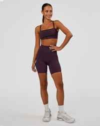 Woman wearing Progression Ultra High-Rise 6" Short - Midnight Plum | Mode:Brylee | Size:XS