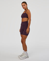 Woman wearing Progression Ultra High-Rise 6" Short - Midnight Plum | Mode:Brylee | Size:XS