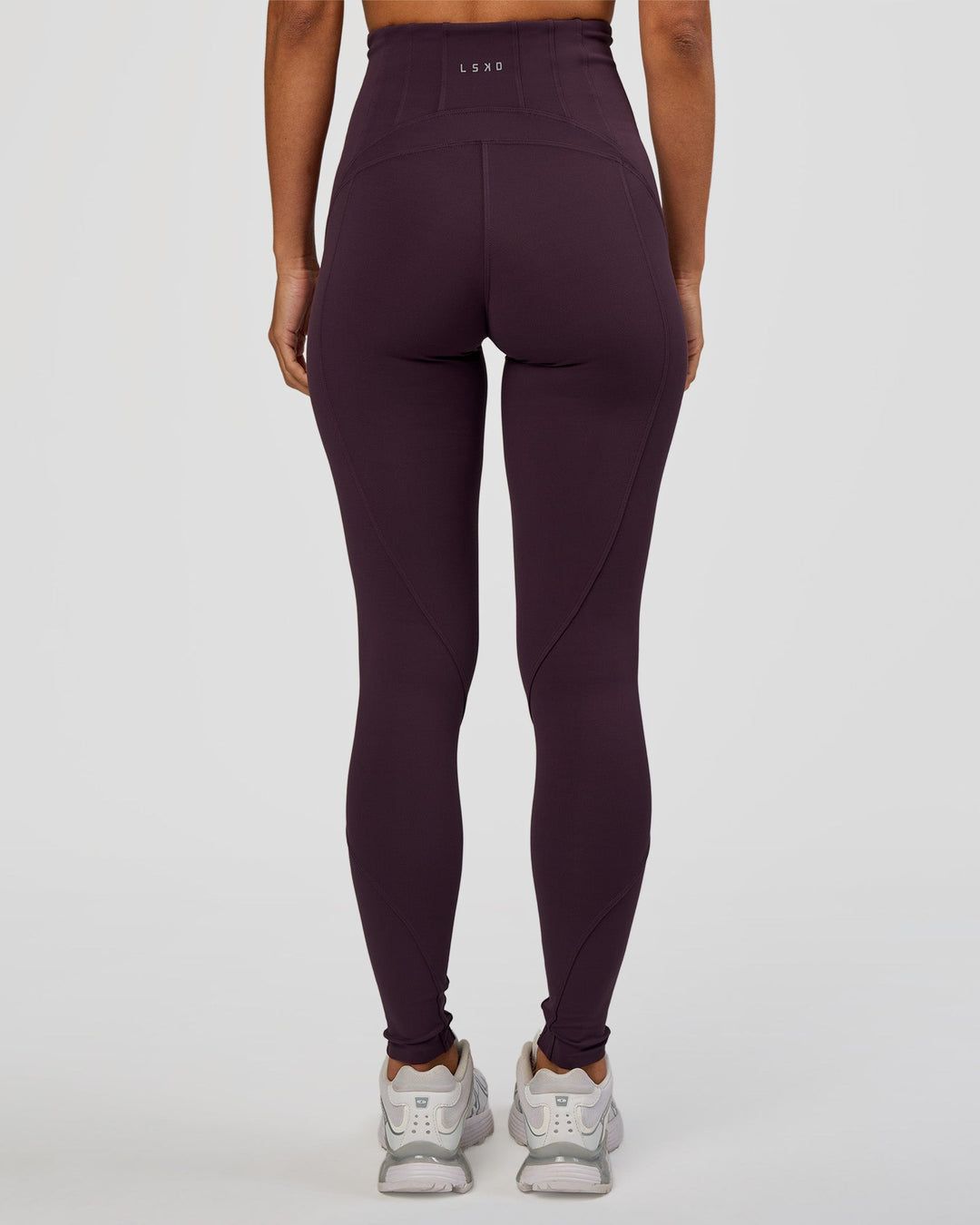 Woman wearing Progression Ultra High-Rise Full Length Legging - Midnight Plum | Model:Brylee | Size:XS
