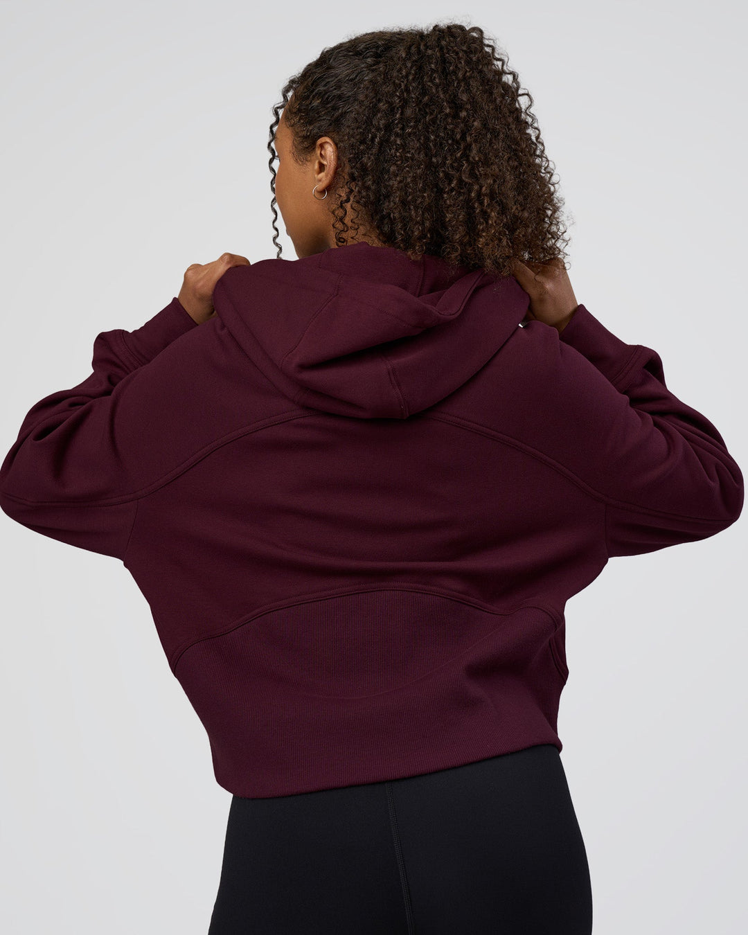 Woman wearing Pursue Mid-Weight Hoodie - Cherry Lacquer | Model:Jordan | Size:XS