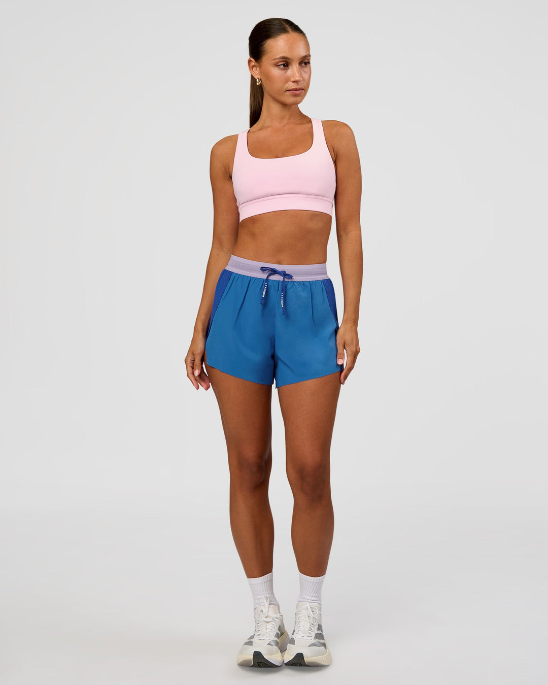 Woman wearing Race Day Sports Bra - Marshmallow | Model:Brylee | Size:XS