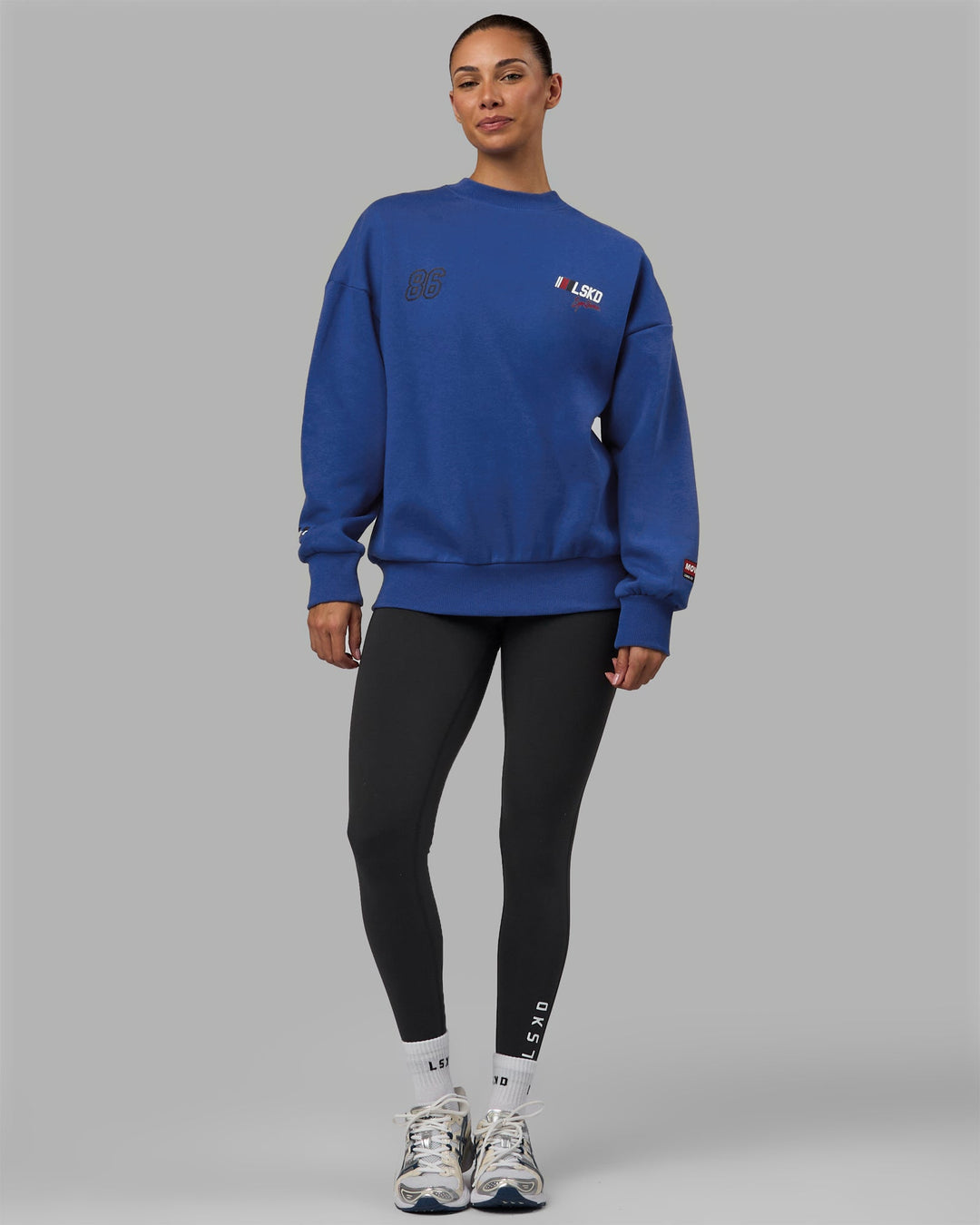 Woman wearing Unisex Redline Sweater Oversize - Power Cobalt-White