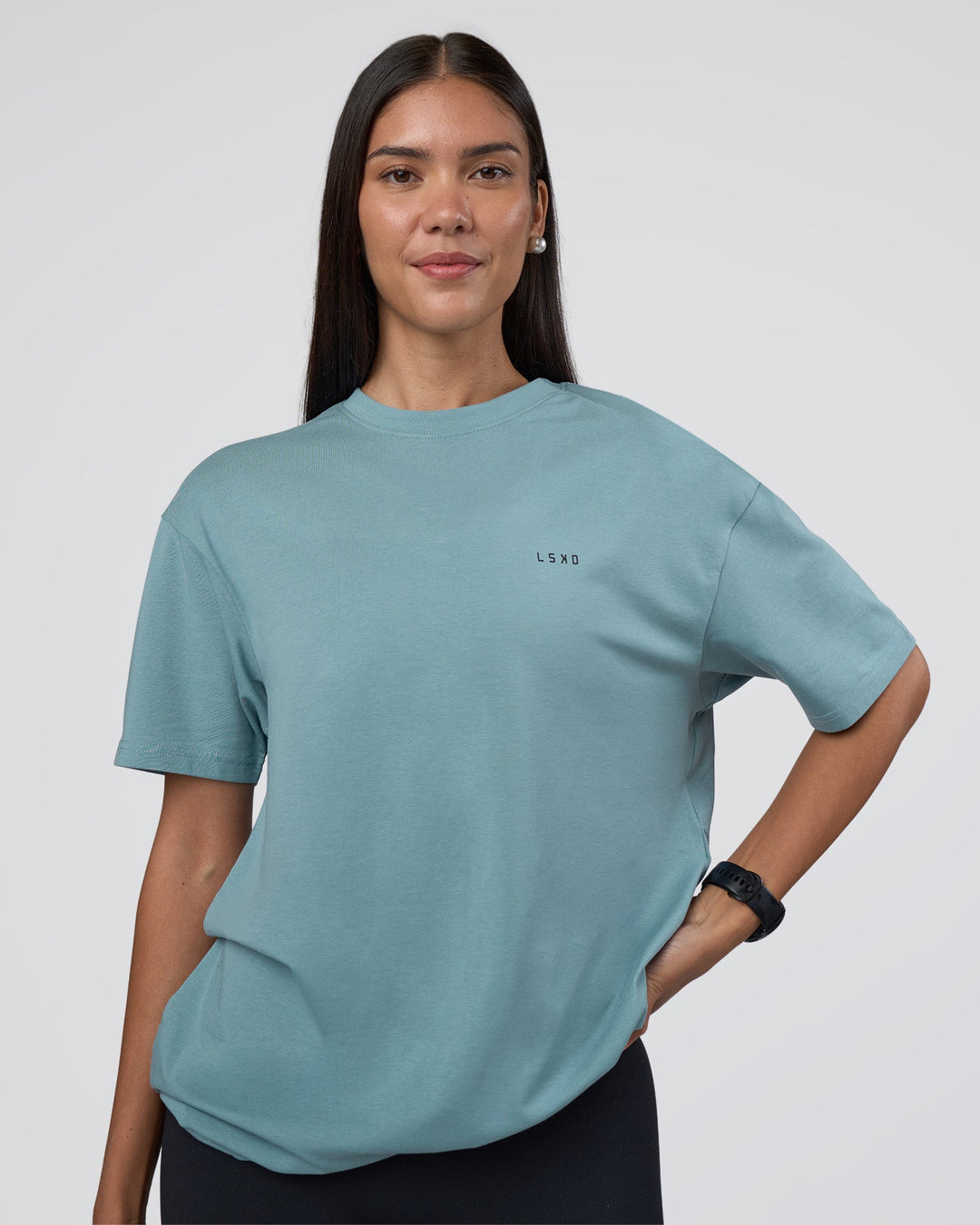 Woman wearing Research Department FLXCotton Oversized Tee - Smoke Blue | Model:Rhiley | Size:XS