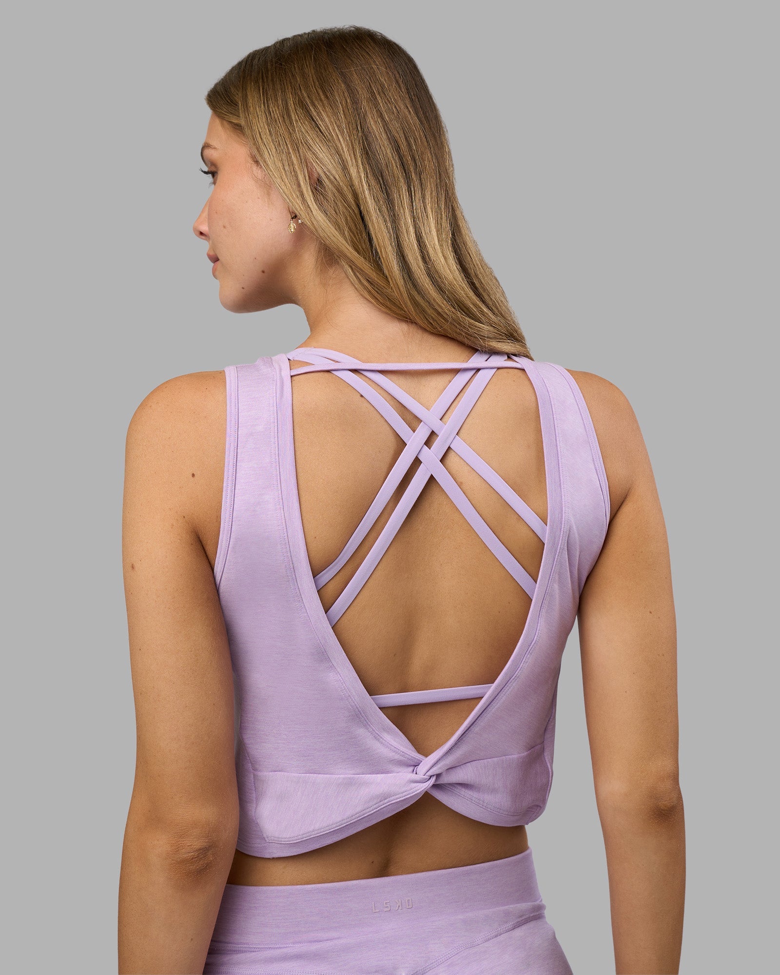 Woman wearing Restore CloudFLX Tank - Orchid Bloom Marl | Model:Leilani | Size:XS