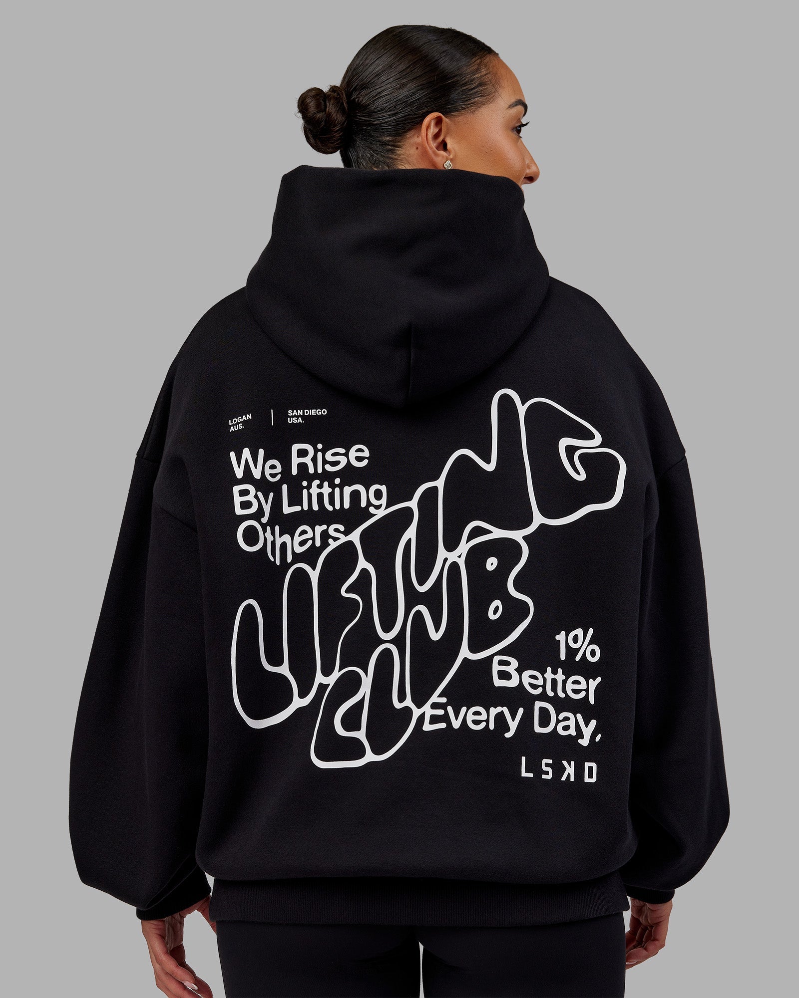 Woman wearing Rise & Lift Hoodie Oversized - Black-White | Model:Ayla | Size:XS