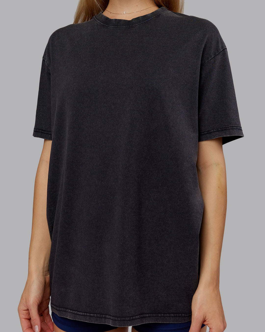 Woman wearing Rise &amp; Lift Washed FLXCotton Oversized Tee - Washed Black-Indigo | Model:Emilie | Size:XS