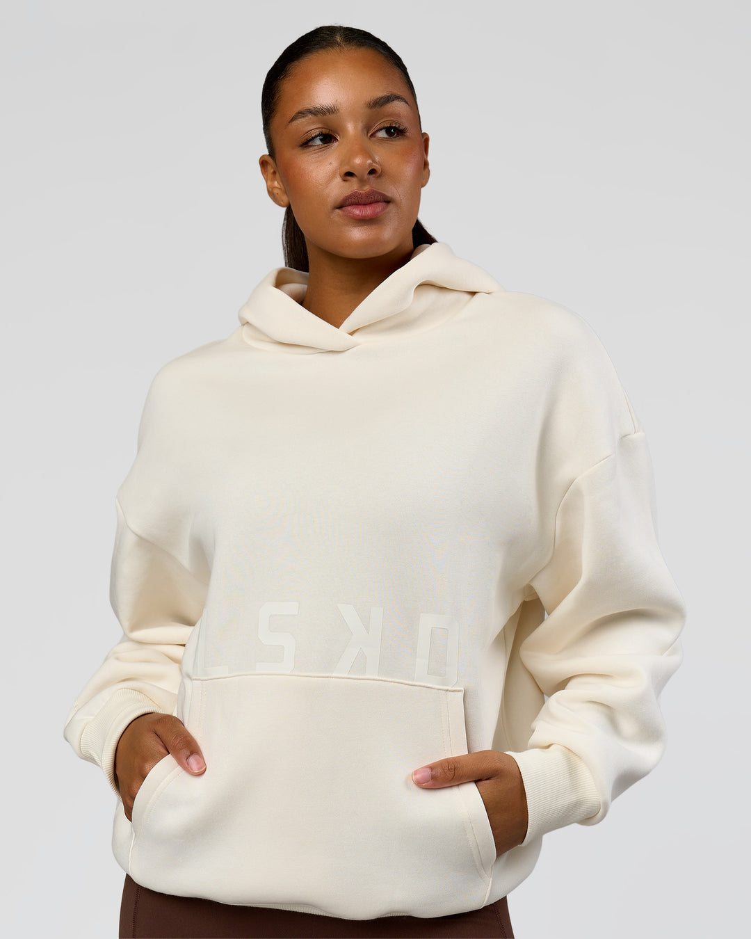 Woman wearing Shadow Mode Oversized Hoodie - Off White | Model:Rosie | Size:XS