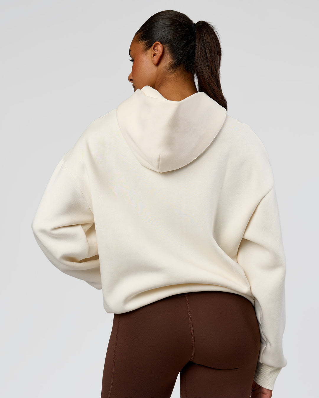 Woman wearing Shadow Mode Oversized Hoodie - Off White | Model:Rosie | Size:XS