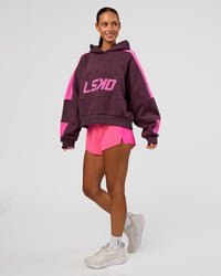 Woman wearing Slam Cropped Oversized Hoodie - Midnight Plum-Ultra Fuchsia | Model:Brylee | Size:XS