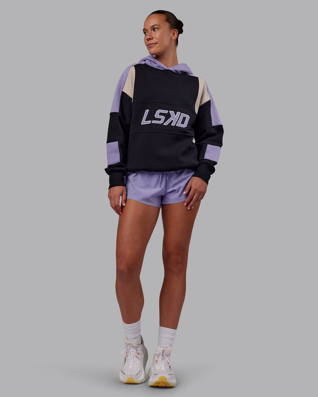 Woman wearing Slam Oversized Hoodie - Caviar-Violet Ray | Model:Charlize | Size:XS
