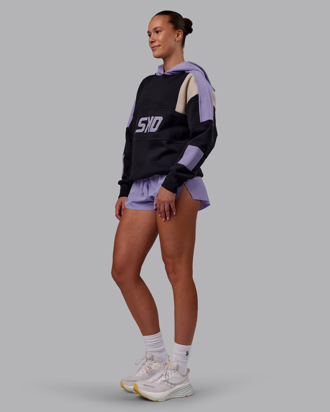 Woman wearing Slam Oversized Hoodie - Caviar-Violet Ray | Model:Charlize | Size:XS