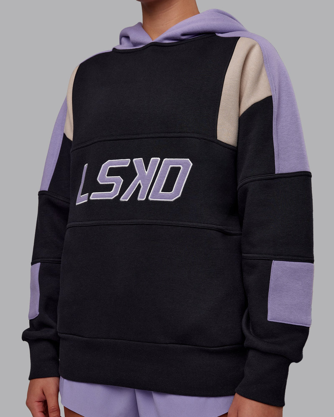 Woman wearing Slam Oversized Hoodie - Caviar-Violet Ray | Model:Charlize | Size:XS