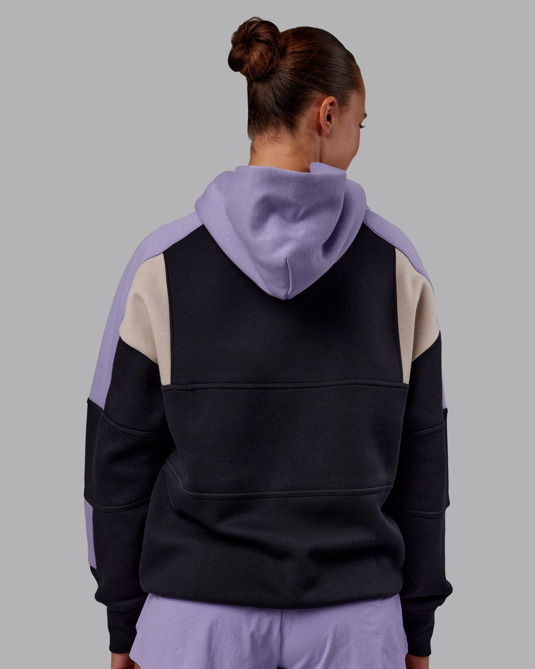 Woman wearing Slam Oversized Hoodie - Caviar-Violet Ray | Model:Charlize | Size:XS