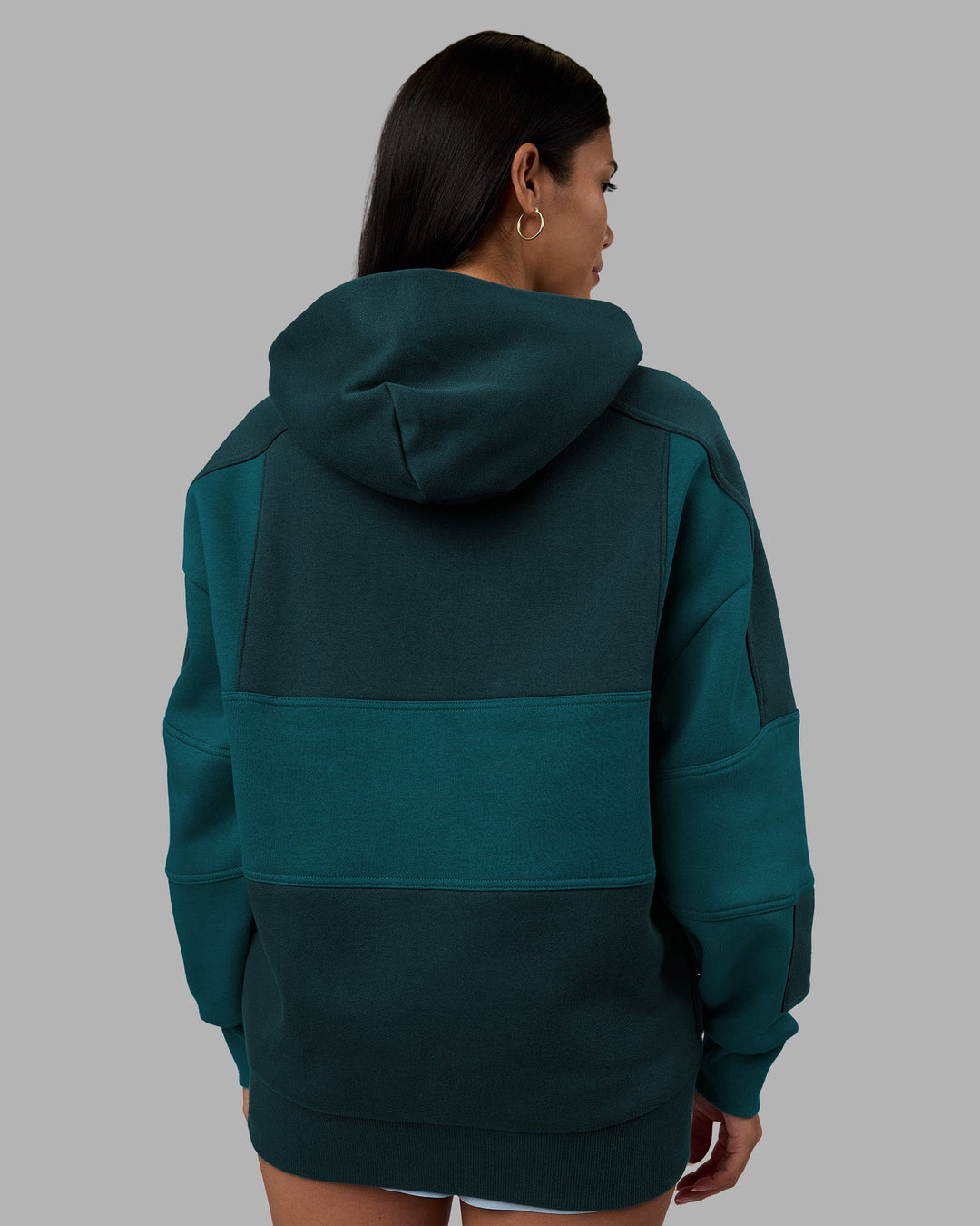 Woman wearing Slam Oversized Hoodie - Deep Sea-Blue Coral | Model:Rhiley | Size:XS