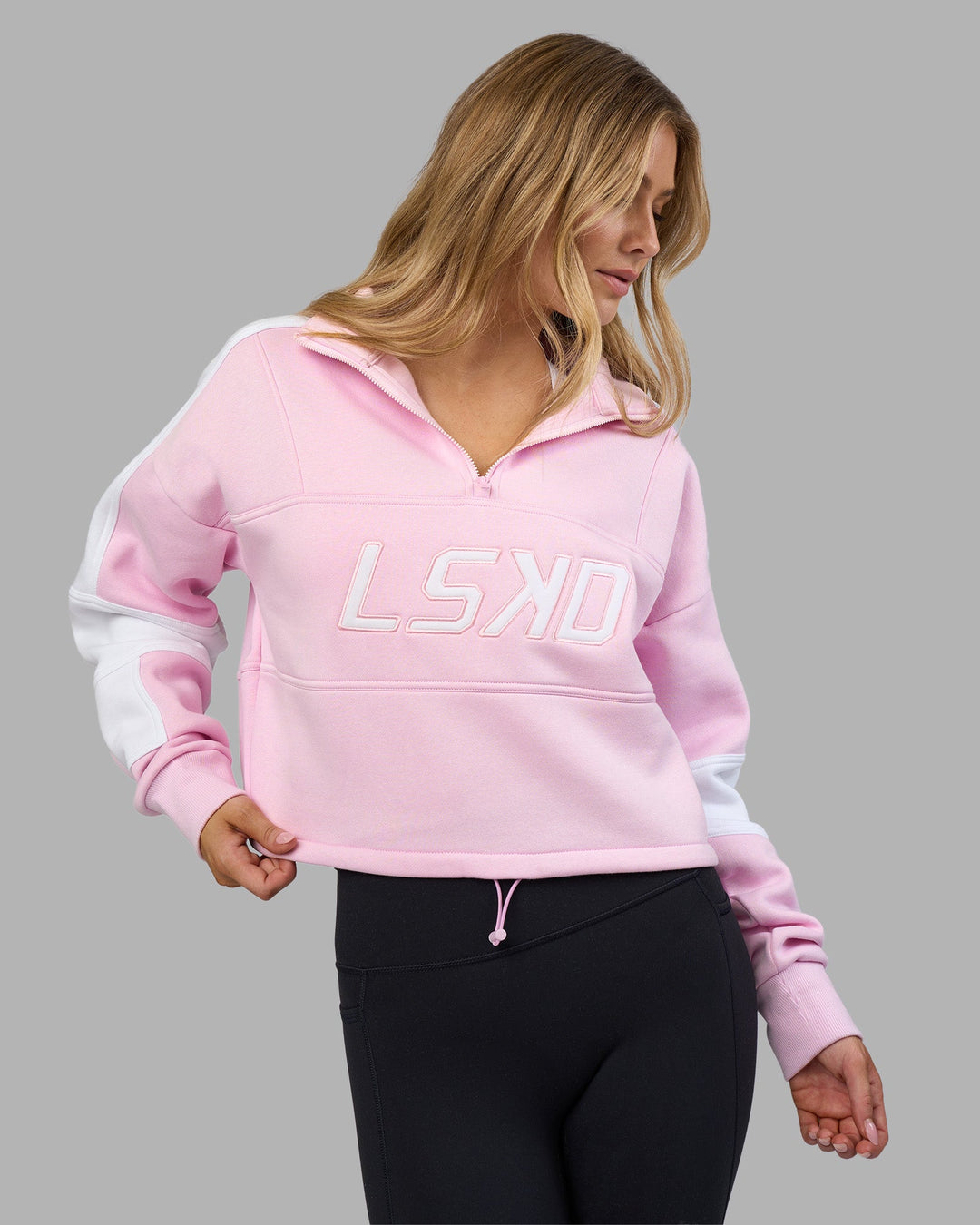 Woman wearing Slam Quarter Zip Sweater - Marshmallow-White | Model:Leilani | Size:XS