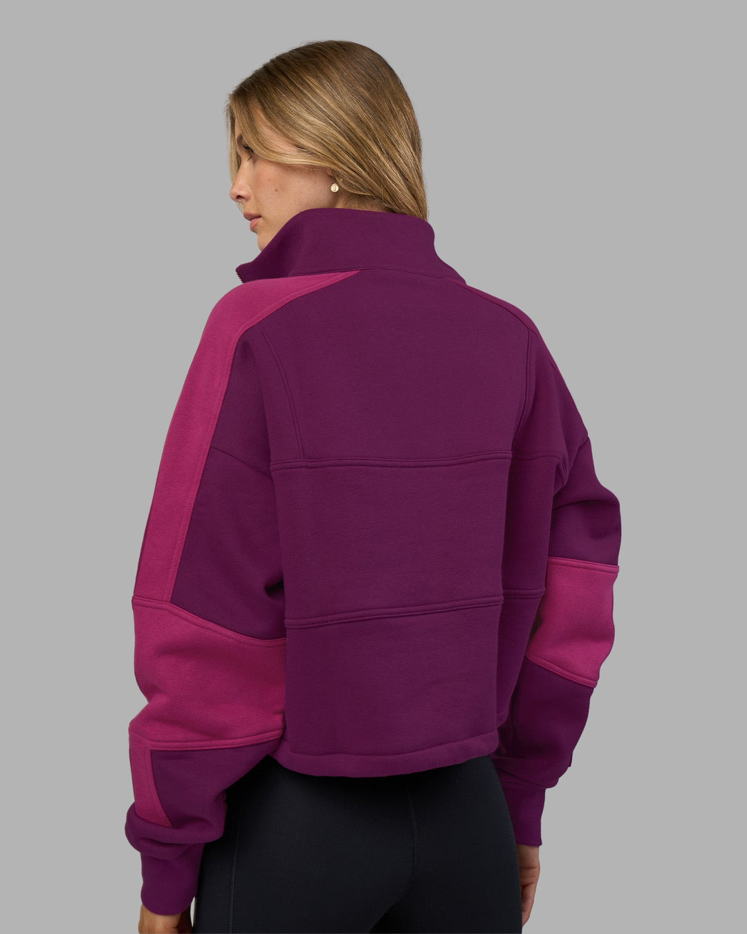 Woman wearing Slam Quarter Zip Sweater - Plum Caspia-Boysenberry | Model:Leilani | Size:XS