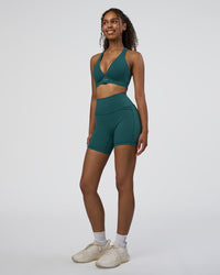 Woman wearing Stamina Sports Bra D/DD/E - Transformative Teal | Model:Jordan | Size:XS