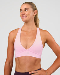 Woman wearing Stamina Sports Bra - Marshmallow | Set:true | Angle:front | Model:Emelia | Size:XS