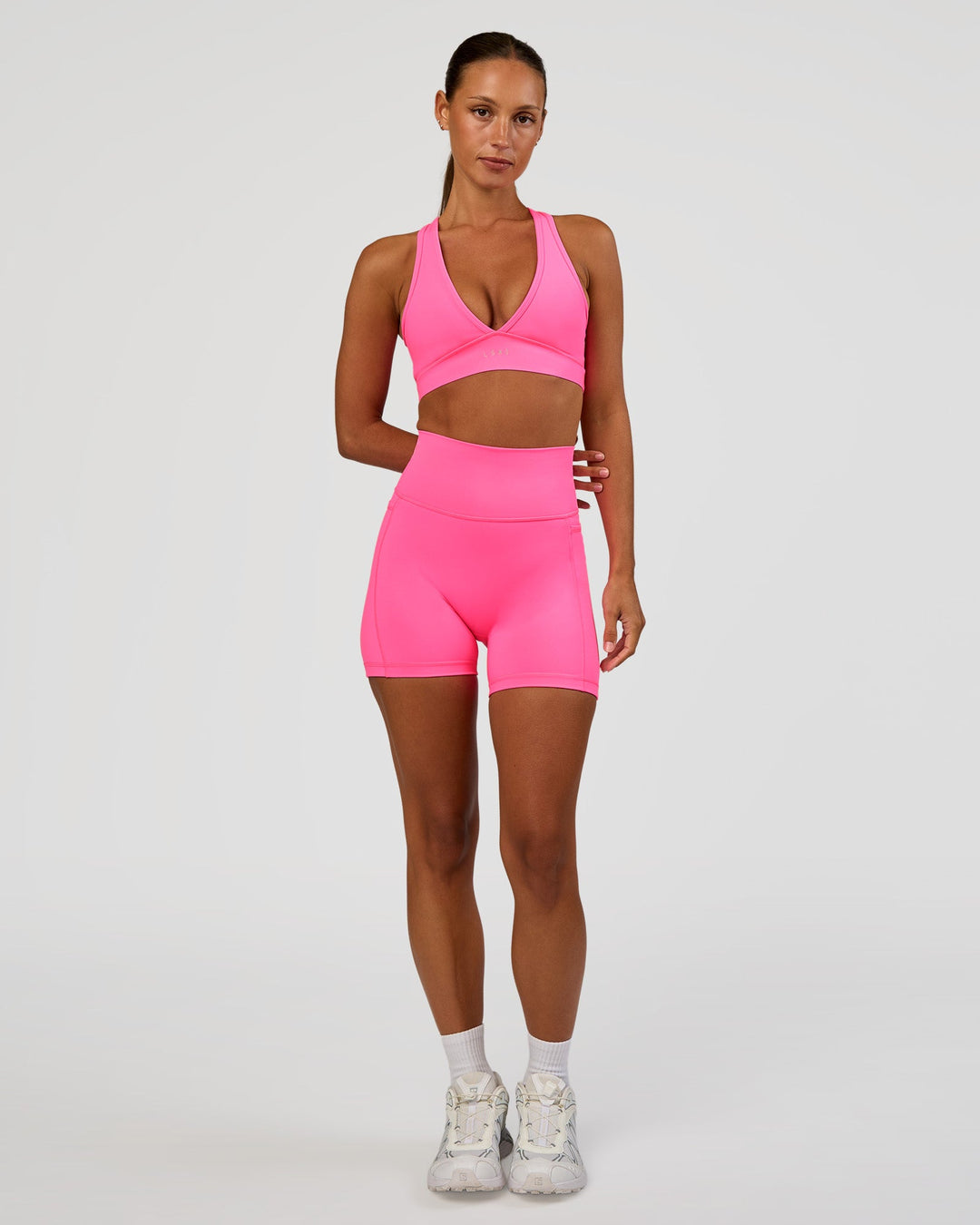 Woman wearing Stamina Sports Bra - Sugar Plum | Model:Brylee | Size:XS
