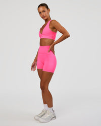 Woman wearing Stamina Sports Bra - Sugar Plum | Model:Brylee | Size:XS