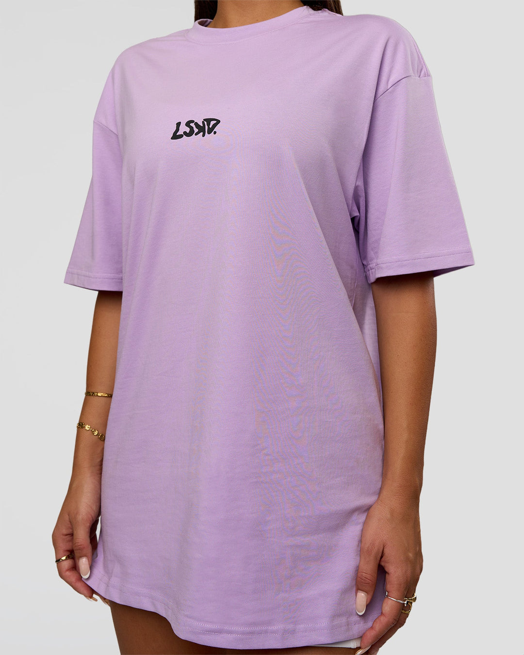 Woman wearing Standard Issue FLXCotton Oversized Tee - Pale Lilac-Black | Model:Bianca | Size:XS