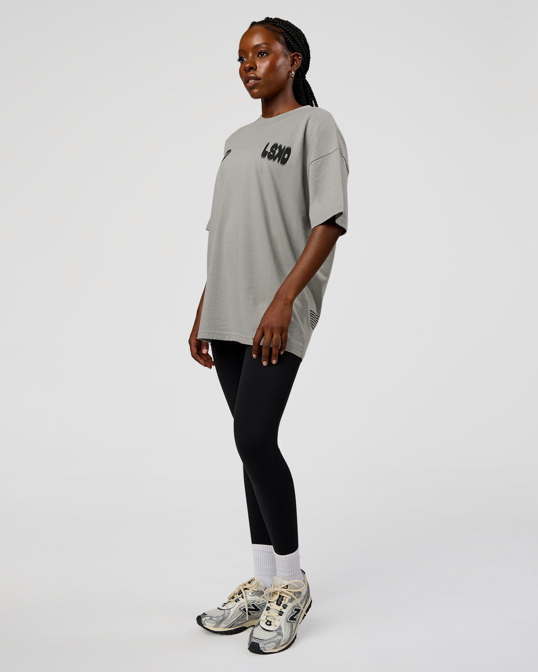 Woman wearing Static Grit Heavyweight Oversized Tee - Alloy-Black | Model:Ellie | Size:XS