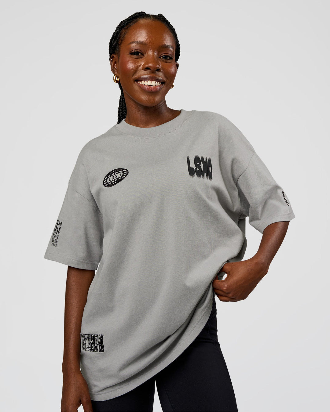 Woman wearing Static Grit Heavyweight Oversized Tee - Alloy-Black | Model:Ellie | Size:XS