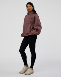 Woman wearing Static Grit Unisex Boxy Hoodie - Cocoa Powder-Hot Chocolate | Model:Loren | Size:XS